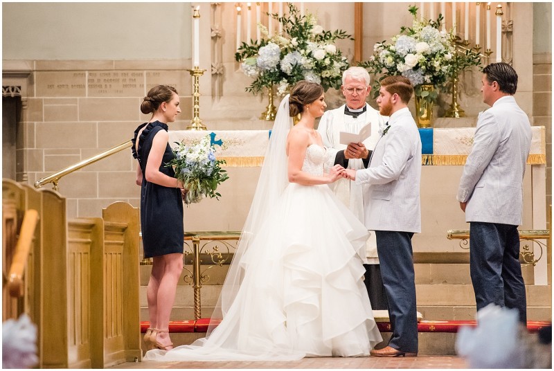 exchanging-rings-church-ceremony-bride-and-groom