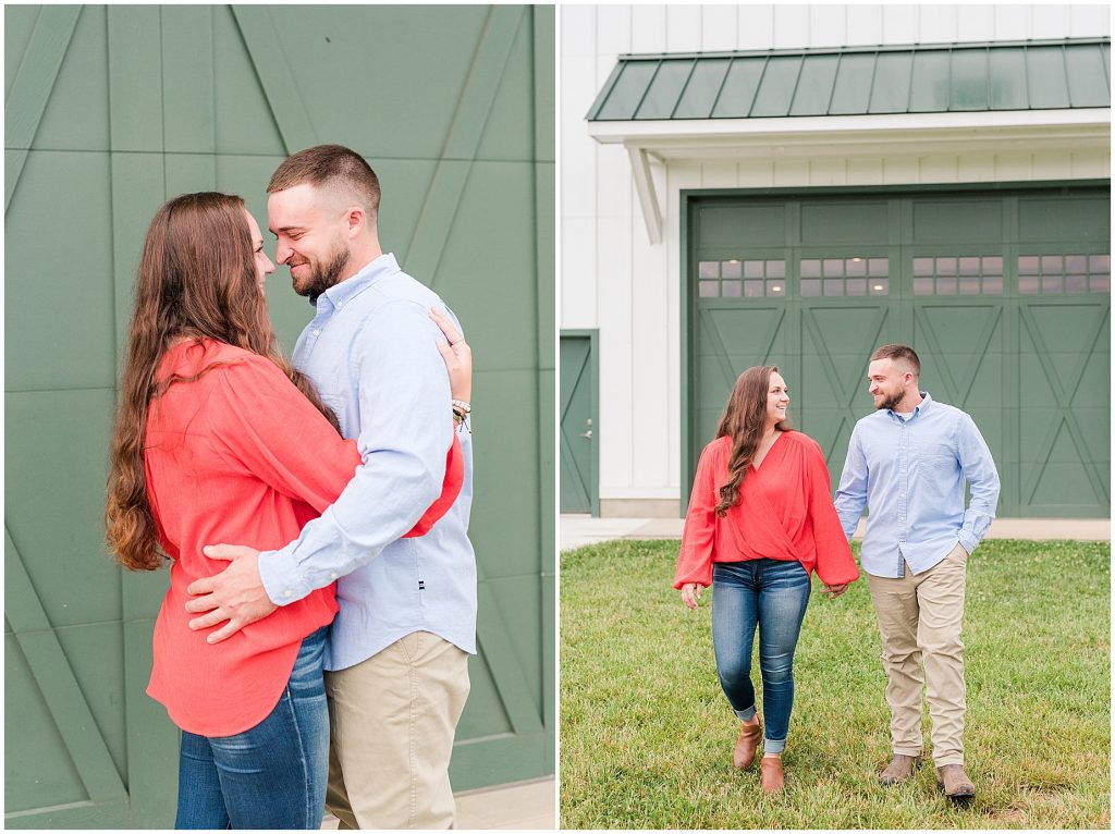 engagement couple in red and blue in front of barn doors at edgewood