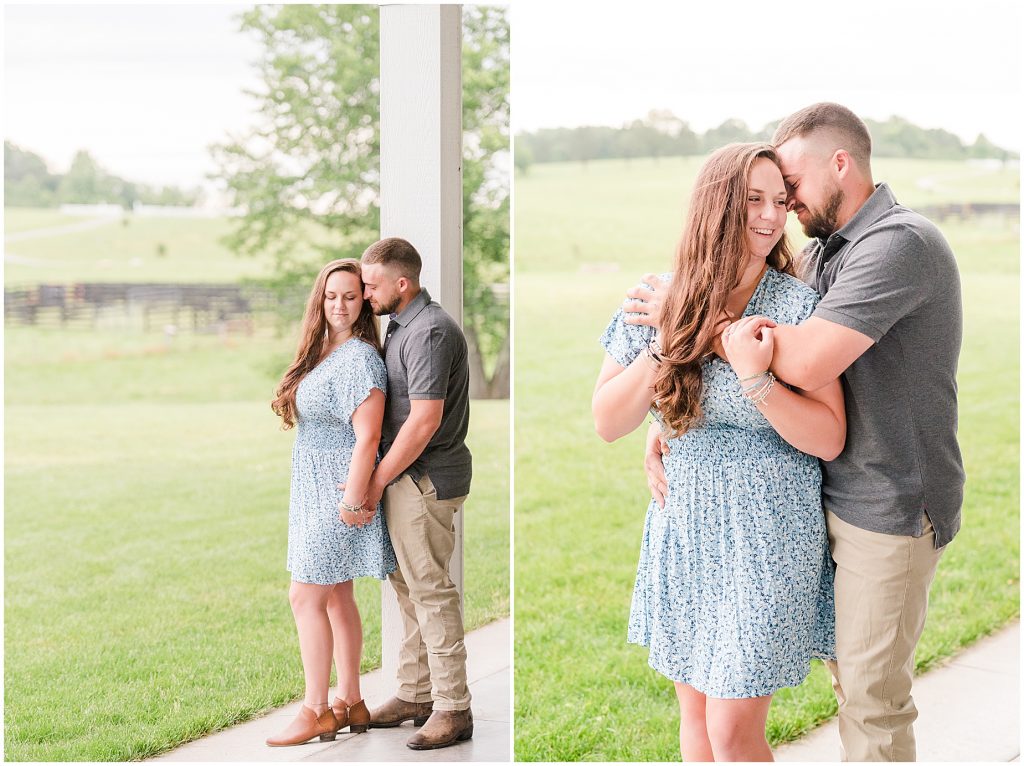 engagement session standing with rain behind them at barn at edgewood
