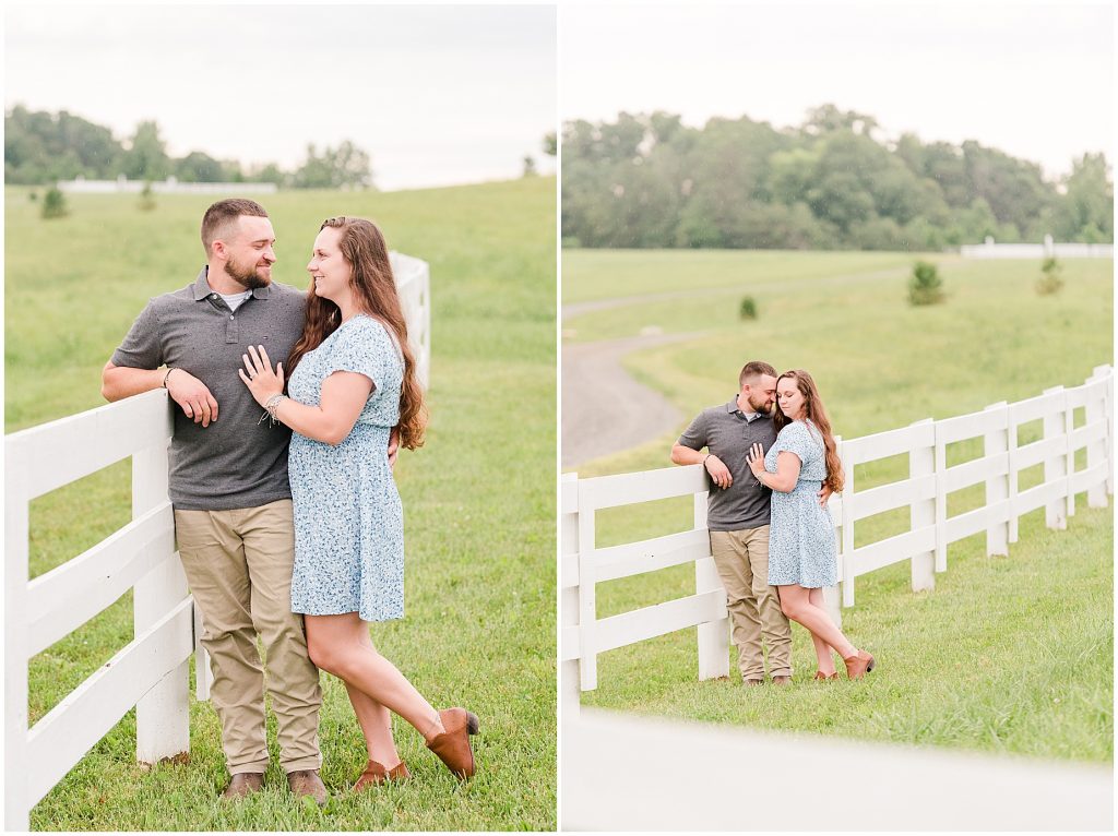 engagement session couple at barn at edgewood next to white fence