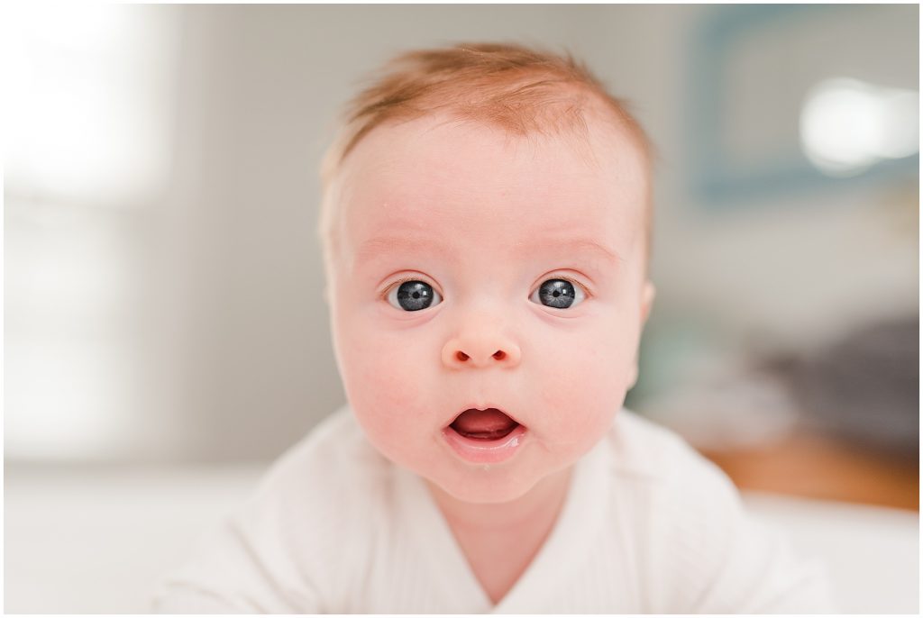 Richmond photographers niles staring at the camera at 3 months