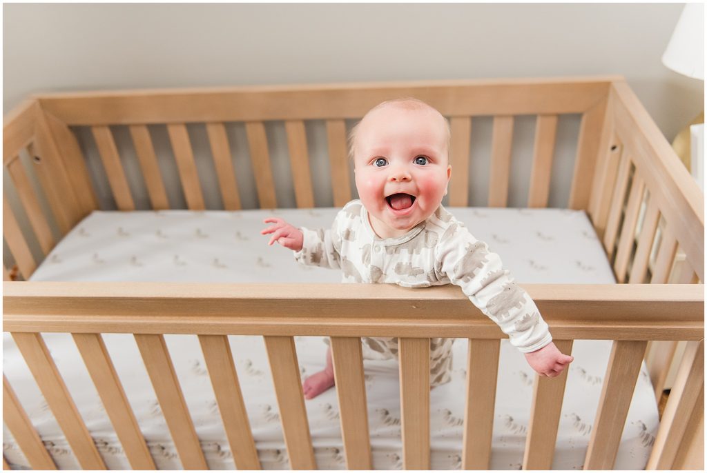 Richmond photographers niles standing in crib