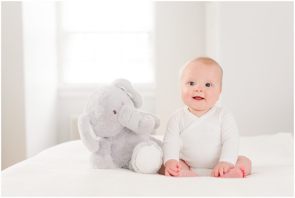 Richmond photographers niles turned 6 months sitting with elephant