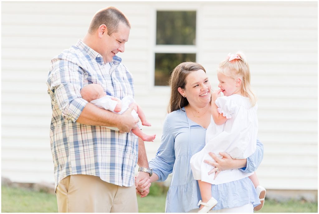 Backyard Newborn and Family walking