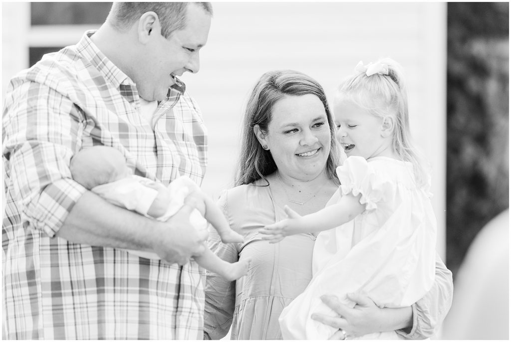 Backyard Newborn and Family Photography toddler playing