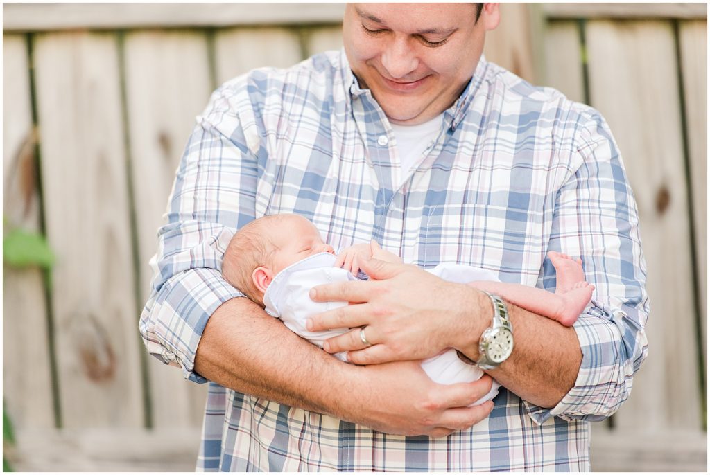 Backyard Newborn and Family Photography dad and son