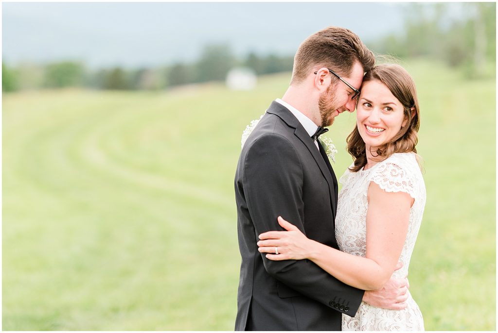 Bride and groom celebrating open field at the barn at edgewood 