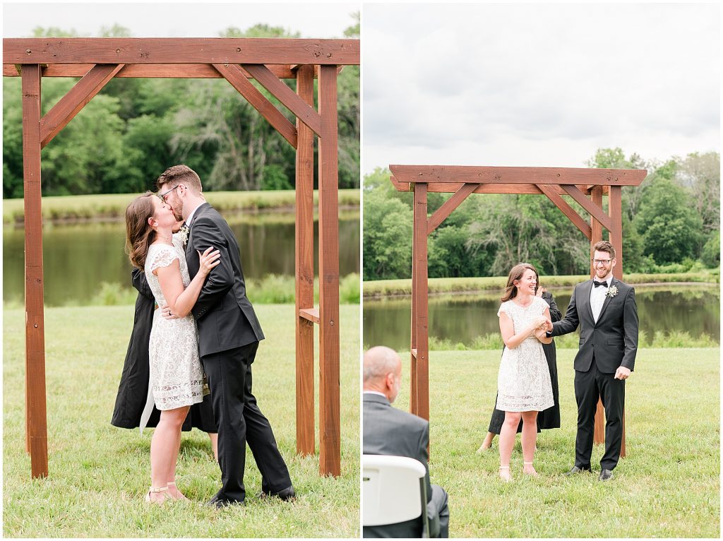 barn at edgewood coronavirus mini wedding bride and groom sharing first kiss