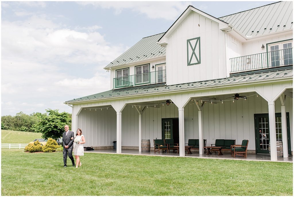 barn at edgewood summer mini wedding bride walking down aisle with dad