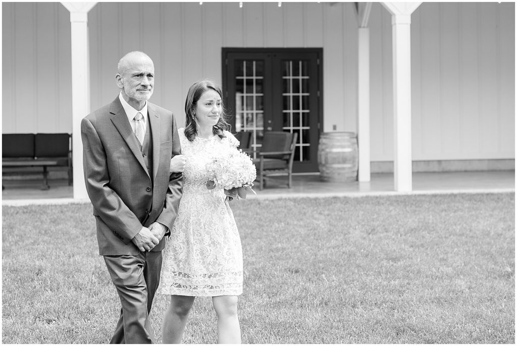 barn at edgewood summer mini wedding bride walking down aisle with dad