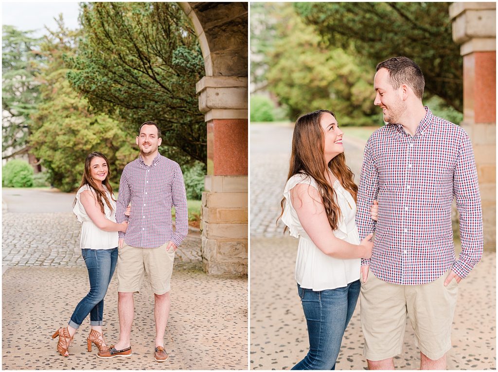 maymont park engagement couple smiling under arch at mansion