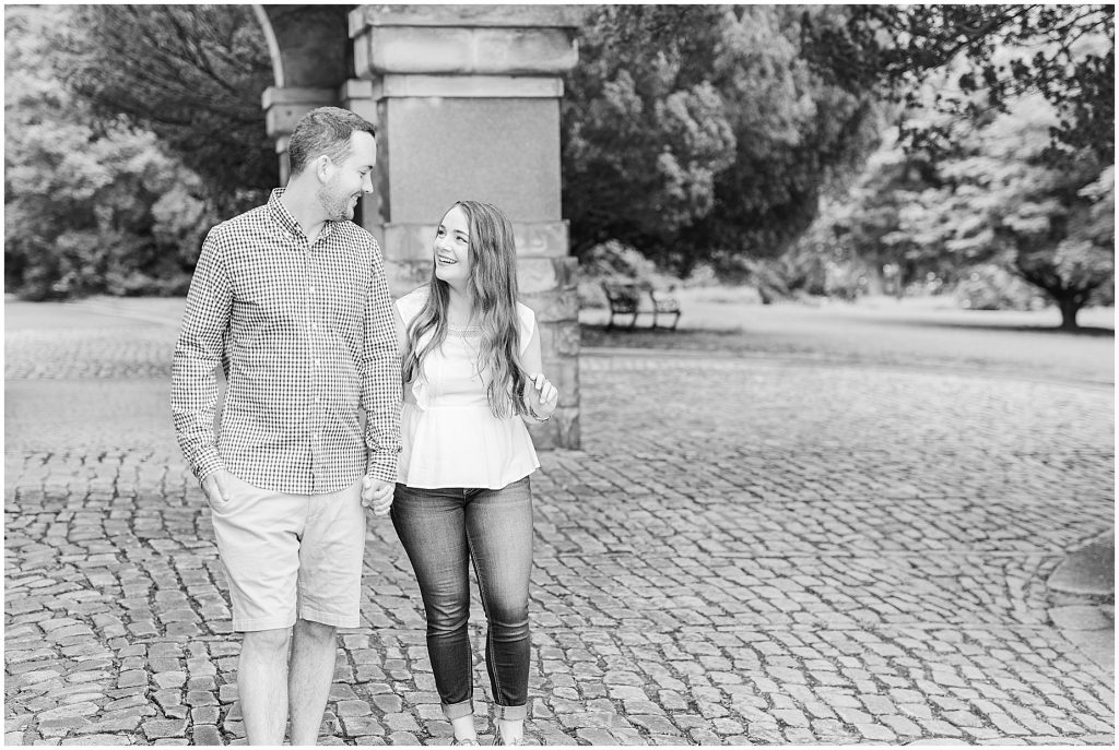 maymont park engagement session with couple on cobblestone path at mansion