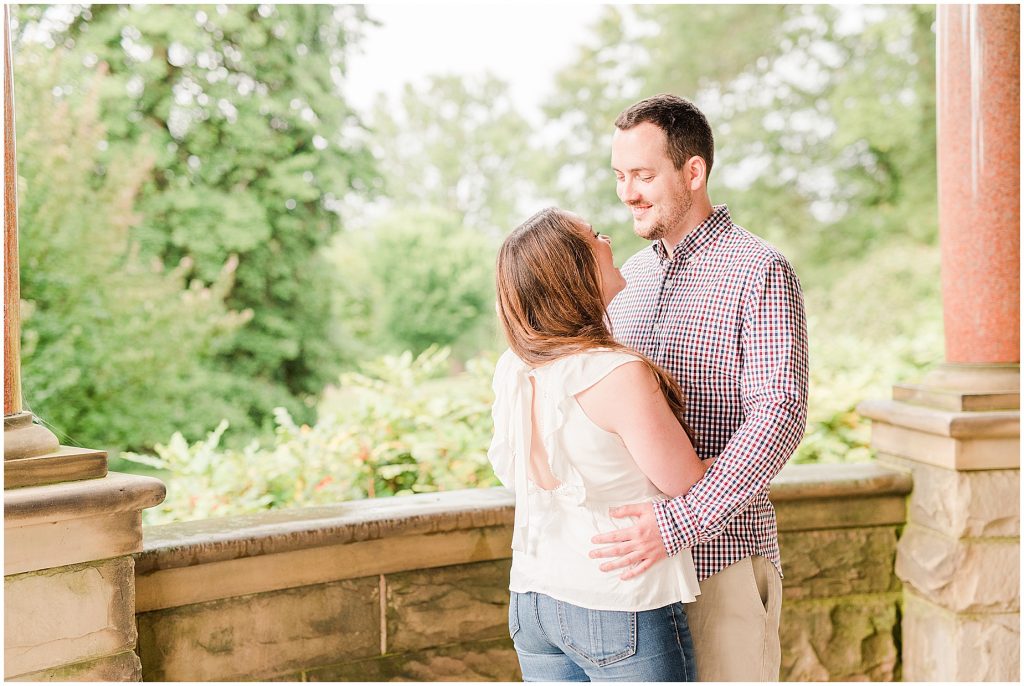 maymont park engagement couple on mansion porch with columns
