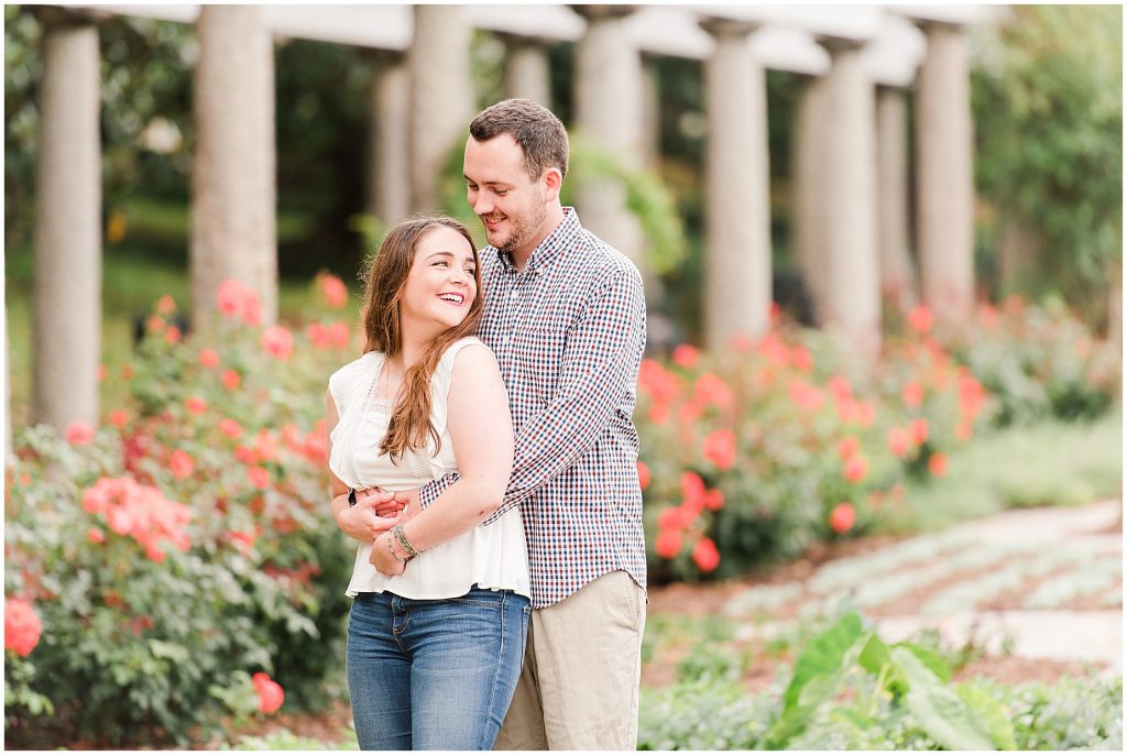 rainy engagement session couple at maymont park in italian flower garden