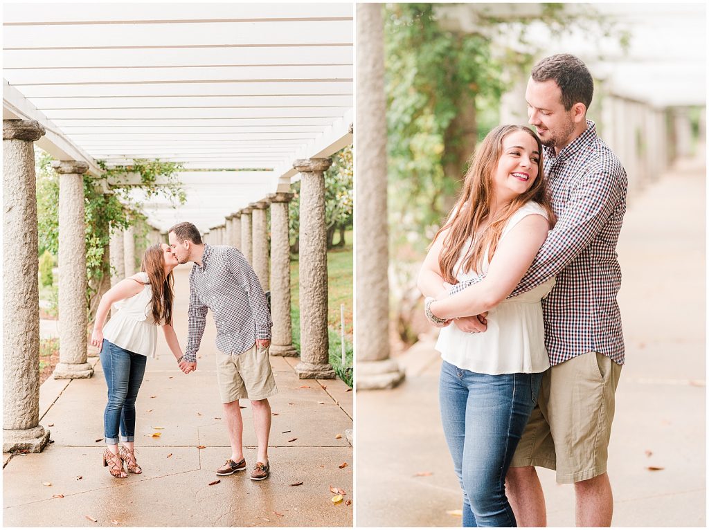 engagement session couple at maymont park walking under gazebo walkway