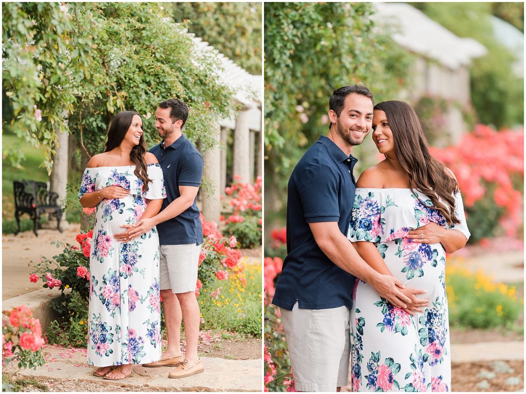 maymont maternity couple with white dress and navy polo near flowers in Richmond Virginia