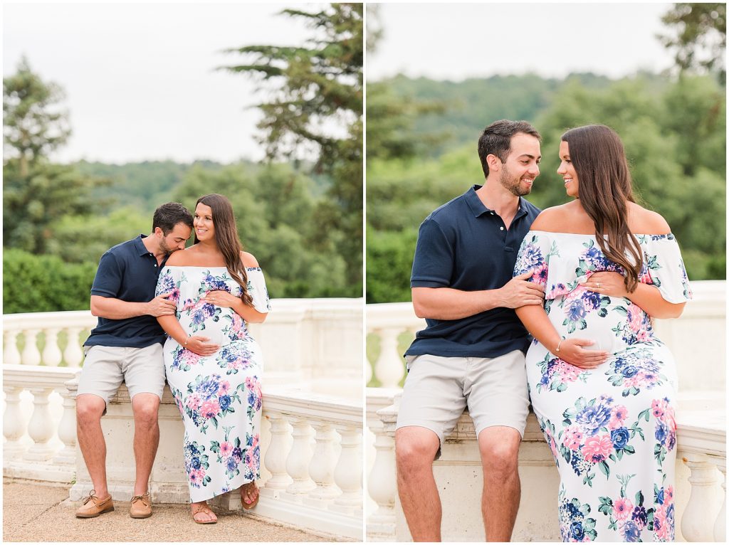 maymont park maternity couple cuddling next to fountain in Richmond Virginia