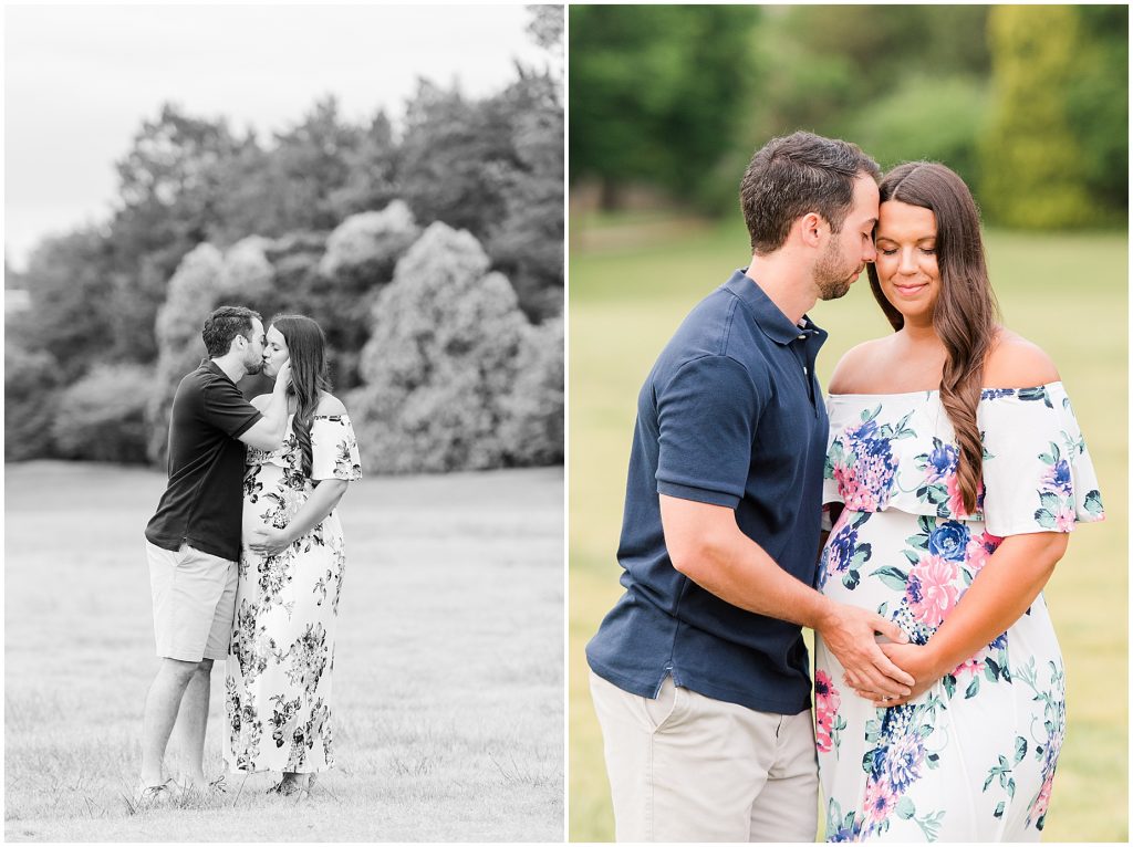 maymont park maternity couple standing in open field sharing a kiss Richmond Virginia