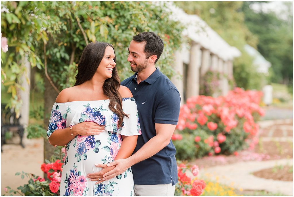 maymont park maternity session couple laughing and holding each other in Richmond Virginia