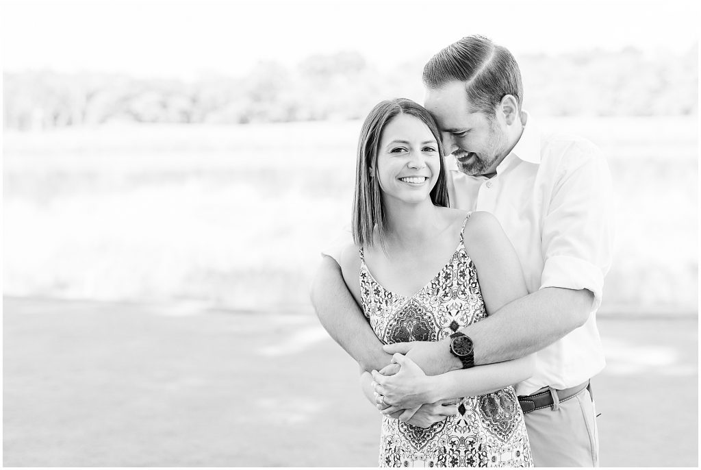 sunny Lansdowne resort engagement session couple on golf course in Leesburg