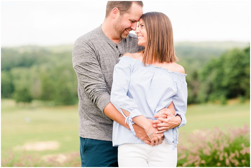 Lansdowne golf resort engagement couple hugging