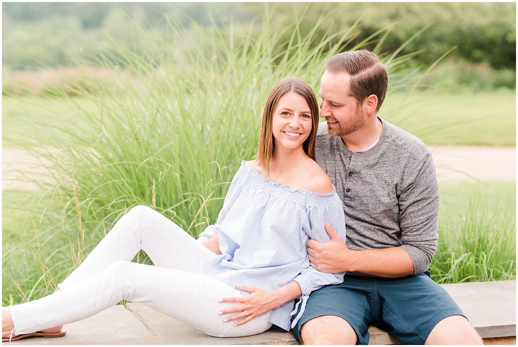 Lansdowne golf resort engagement couple sitting and laughing