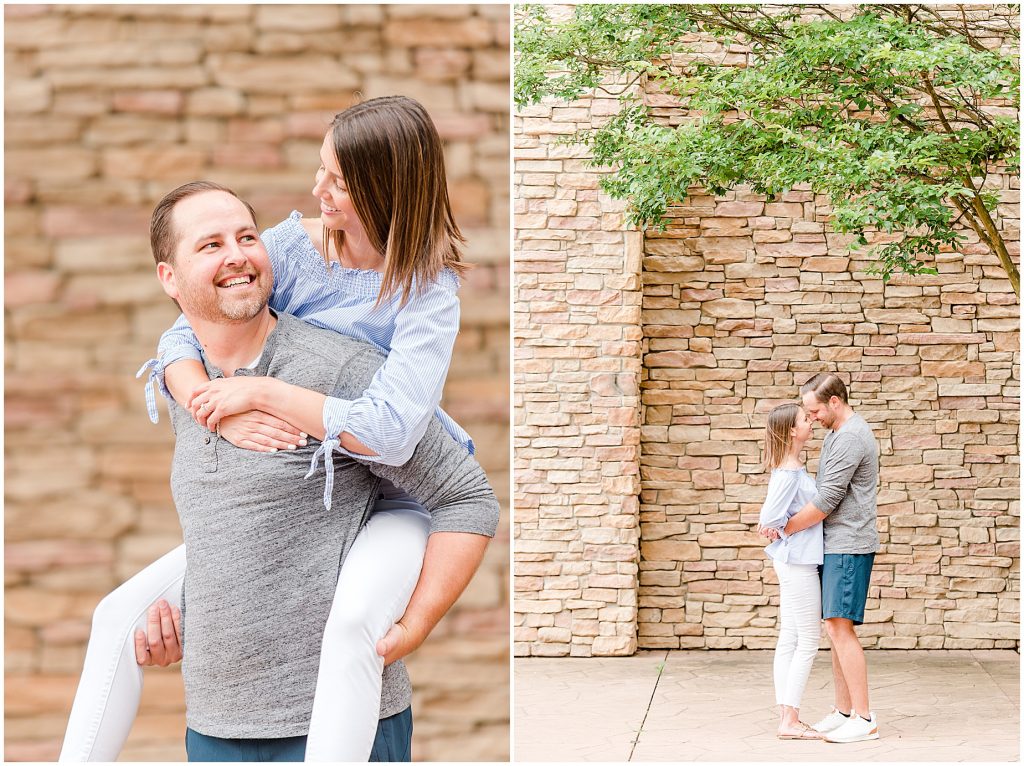 Lansdowne golf resort engagement couple giving a piggy back ride in front of stone wall