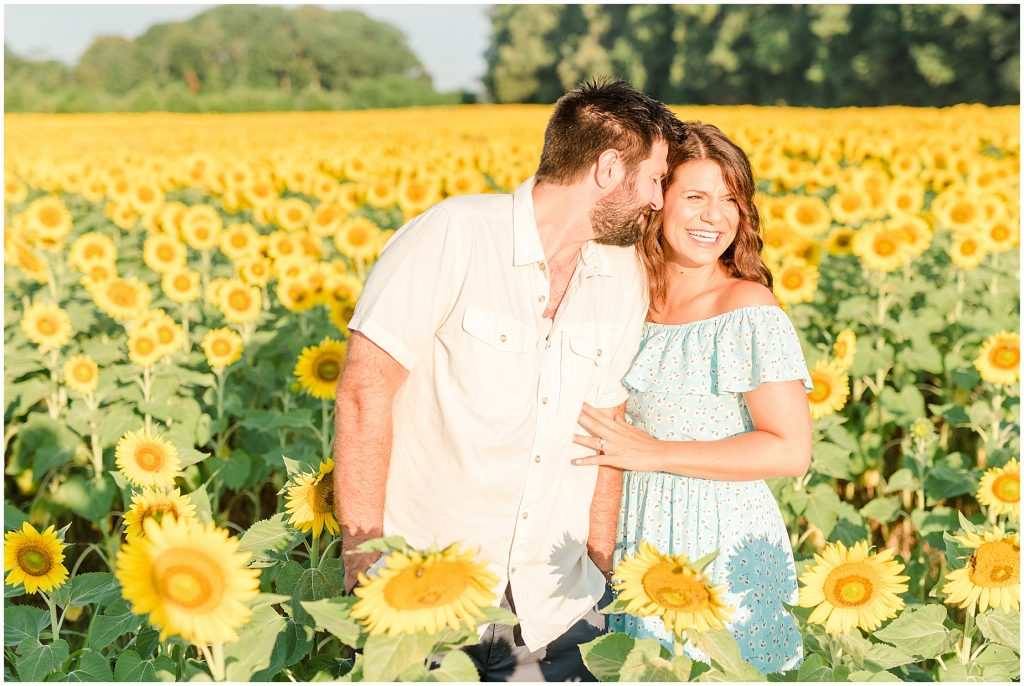 full sun engagement session in sunflower fields, richmond virginia