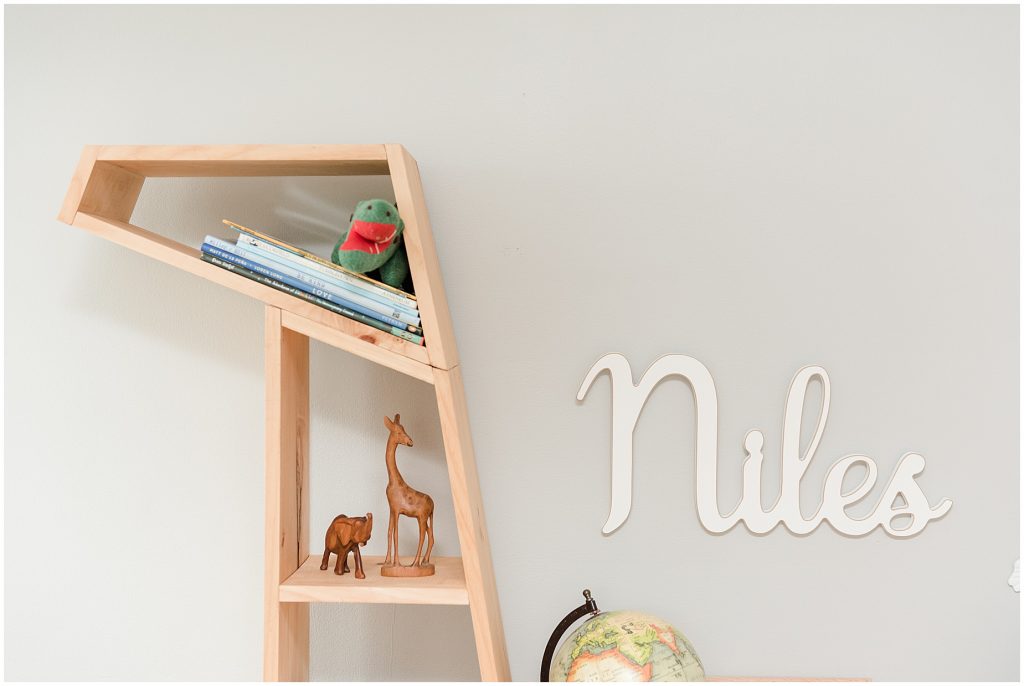 pottery barn cursive baby name in safari themed nursery