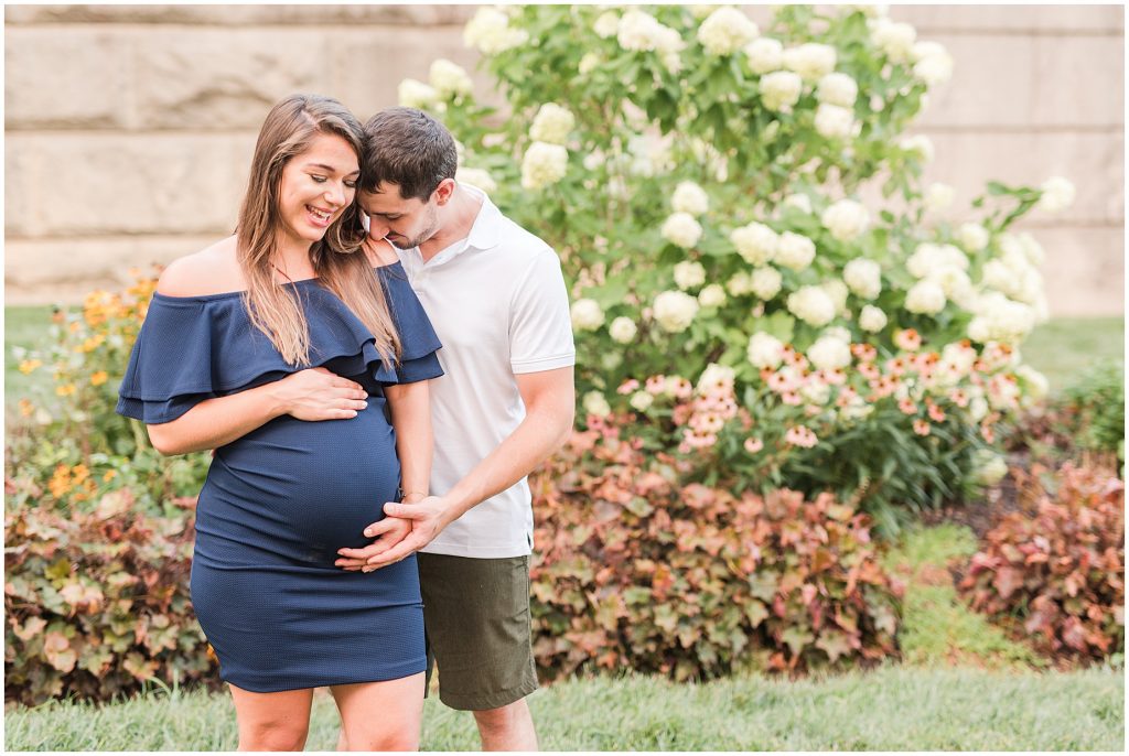 VMFA Richmond Maternity pregnant mother to be and father in front of flower bed