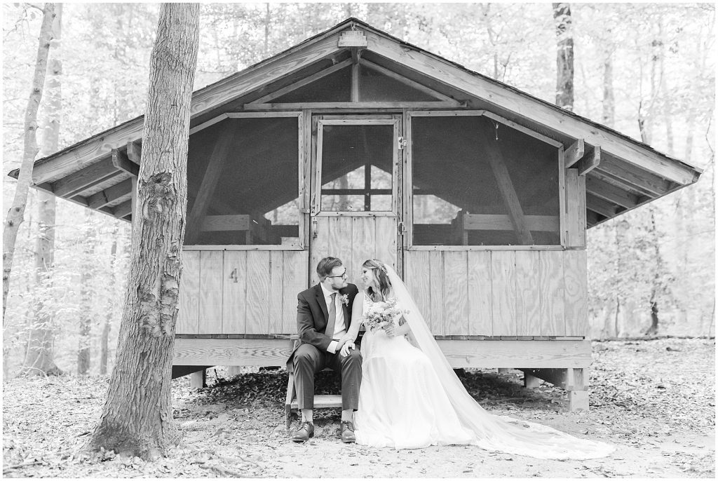 bride & groom at cabin chanco on the james river richmond virginia wedding photographers