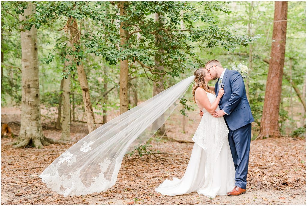 bride & groom at cabin chanco on the james river richmond virginia wedding photographers