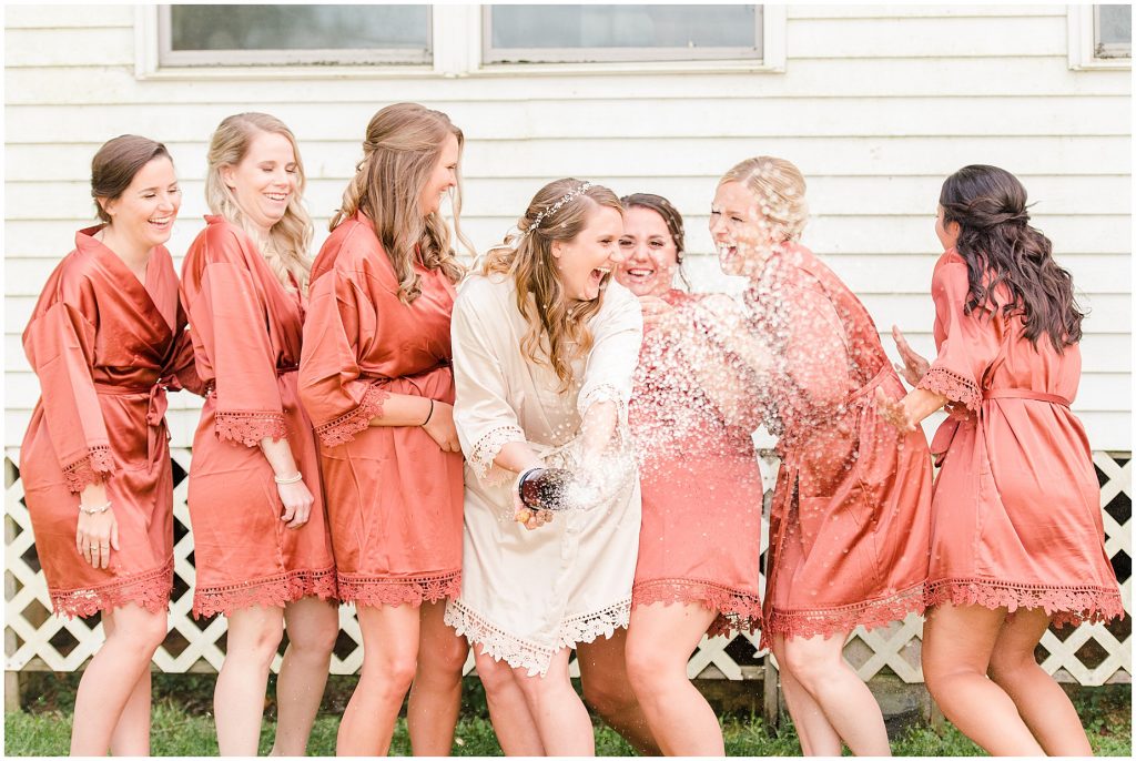 bridesmaids in robes champagne getting ready richmond wedding photographers