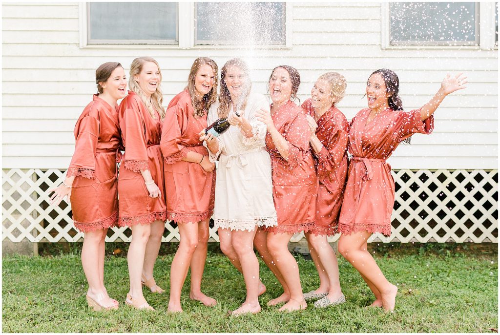 bridesmaids in robes champagne getting ready richmond wedding photographers