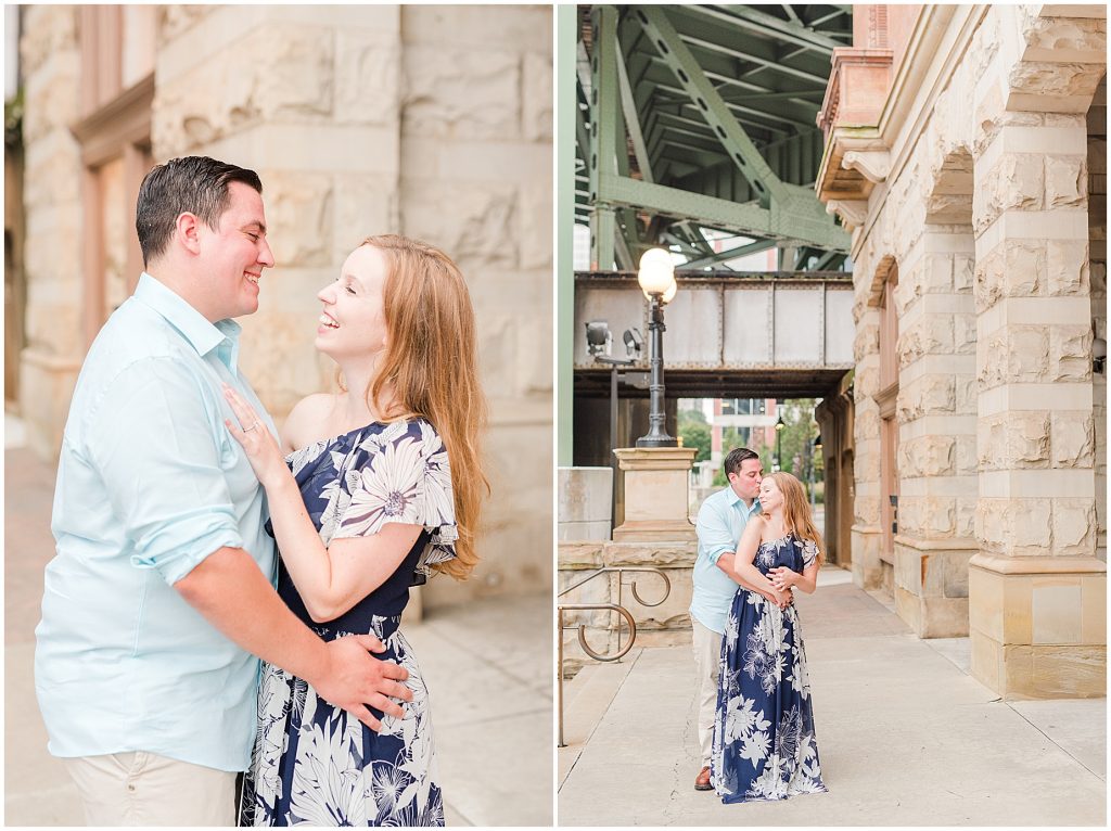 engaged couple standing by main street station in downtown richmond