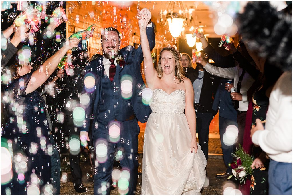 wedding reception bubble gun exit