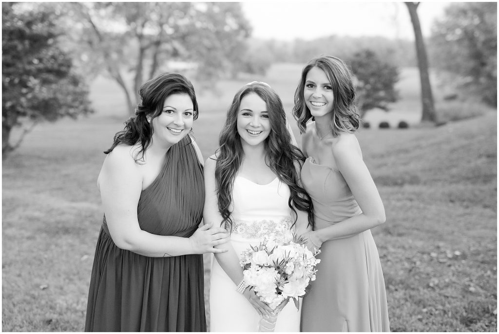 maid and matron of honor with bride after virginia wedding 