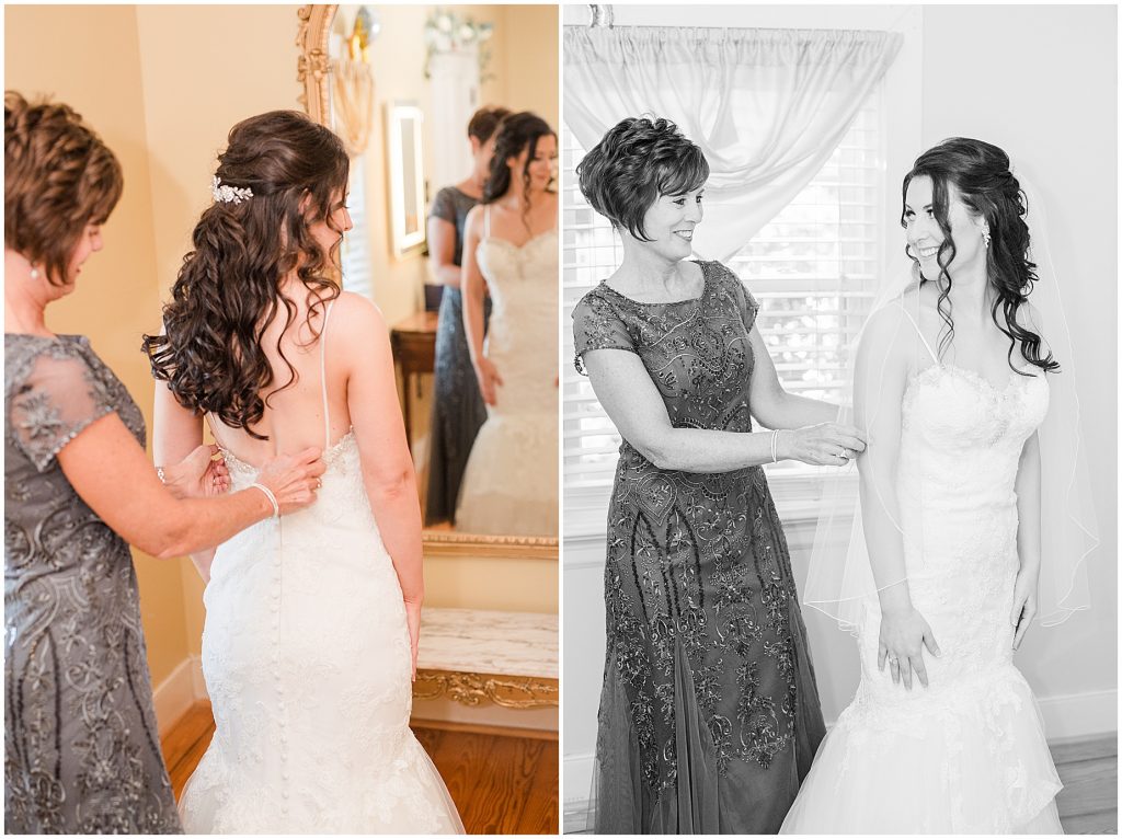 mother helping bride into wedding dress at amber grove bridal suite