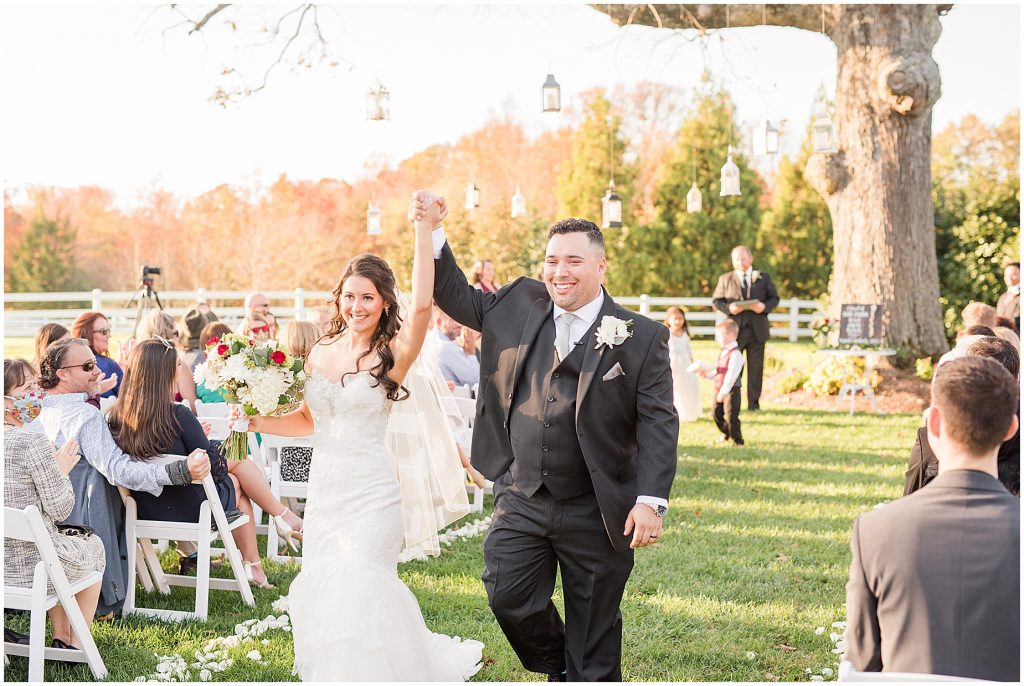 ceremony at amber grove virginia wedding venue bride and groom leaving ceremony