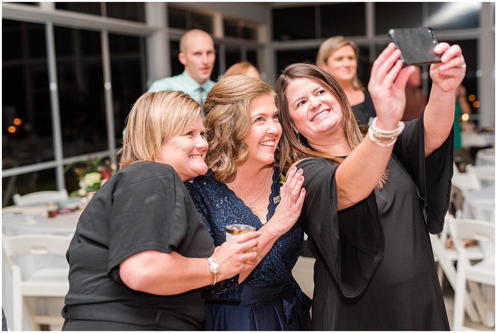 selfie of mother of groom and friends at reception