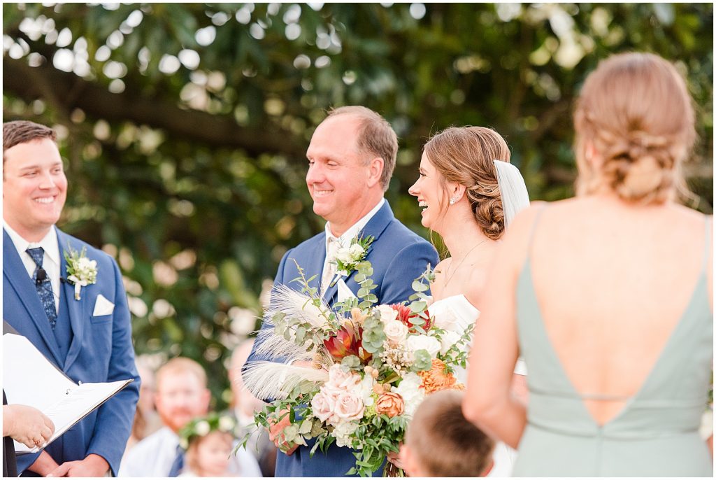 bride and father of bride walking down aisle at Waverly Estate