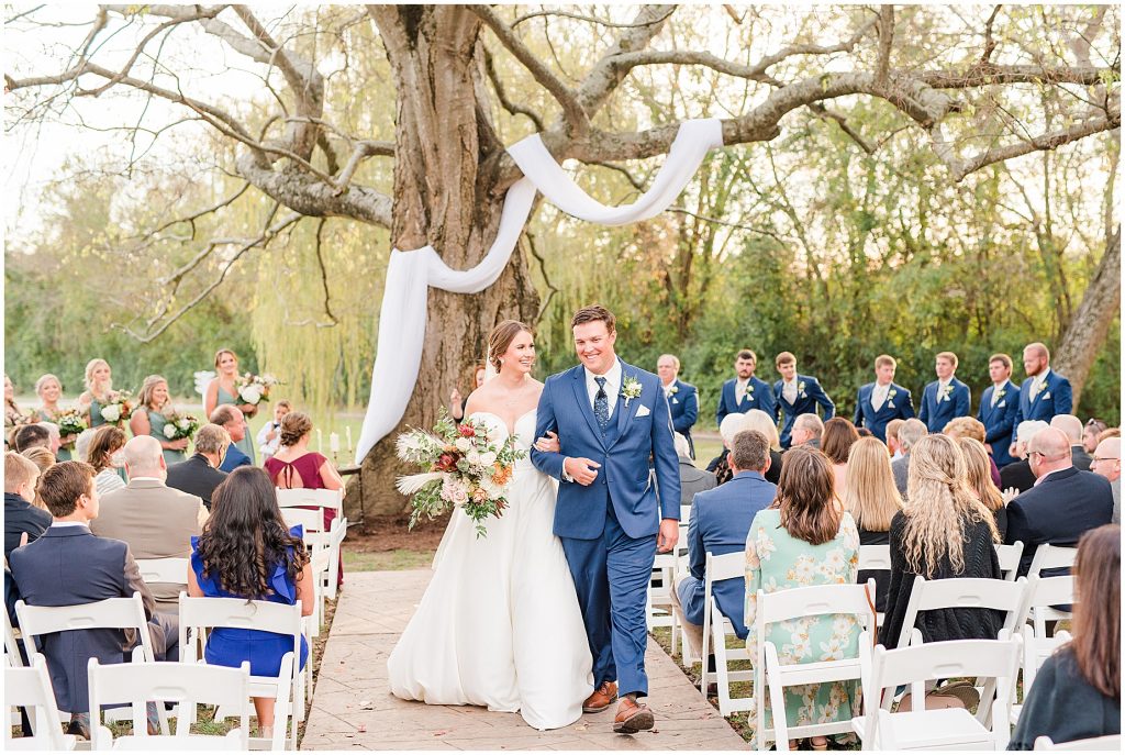 bride and groom walking down aisle married at Waverly Estate ceremony