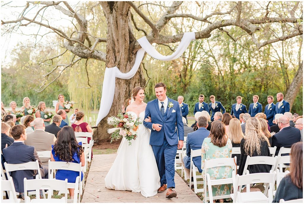 bride and groom walking down aisle married at Waverly Estate ceremony