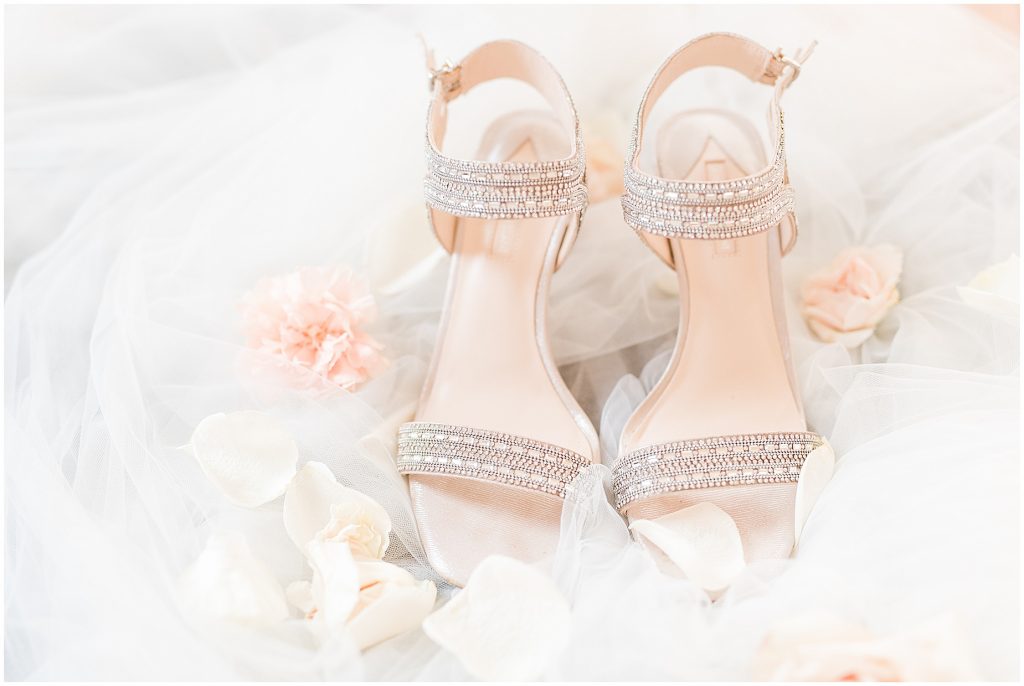 classic silver sparkly shoes detail on veil with flower accents virginia wedding details