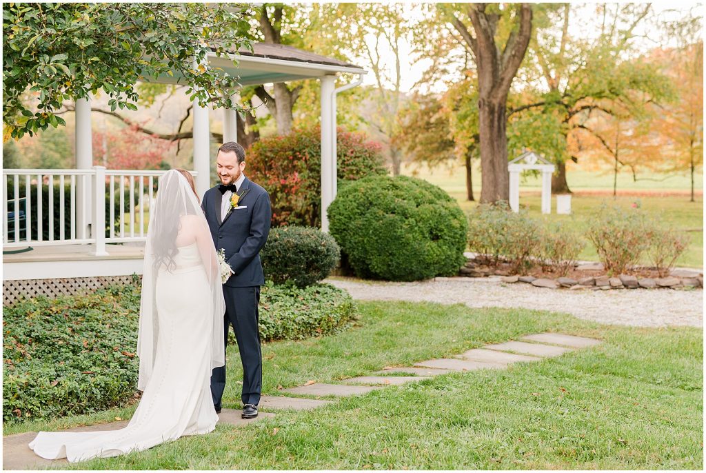 bride and groom first look at whitehall estate in bluemont virginia