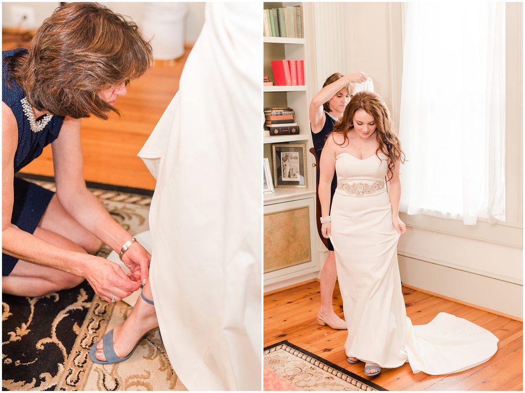 bridal suite at whitehall estate in bluemont virginia mother of the bride helping into dress