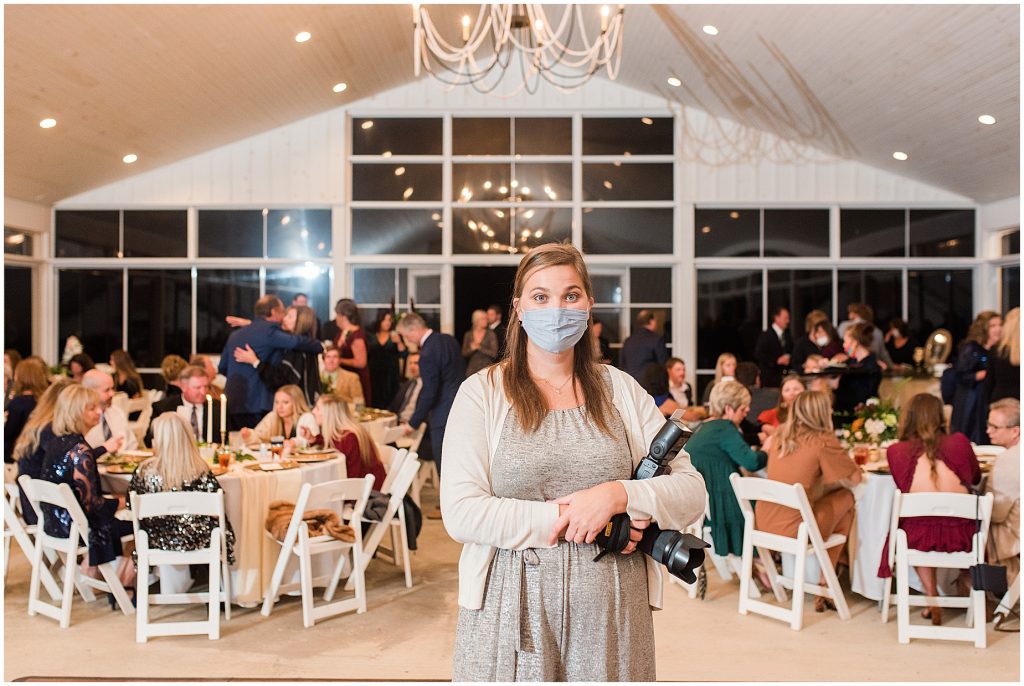 photographer posing at a reception at Waverly Estate in Lunenberg, Va