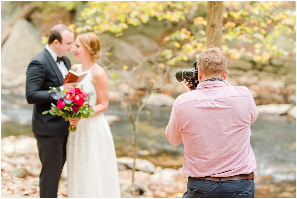 Virginia Photographers Behind the Scenes taking photos of the bride and groom at a park in Washington DC