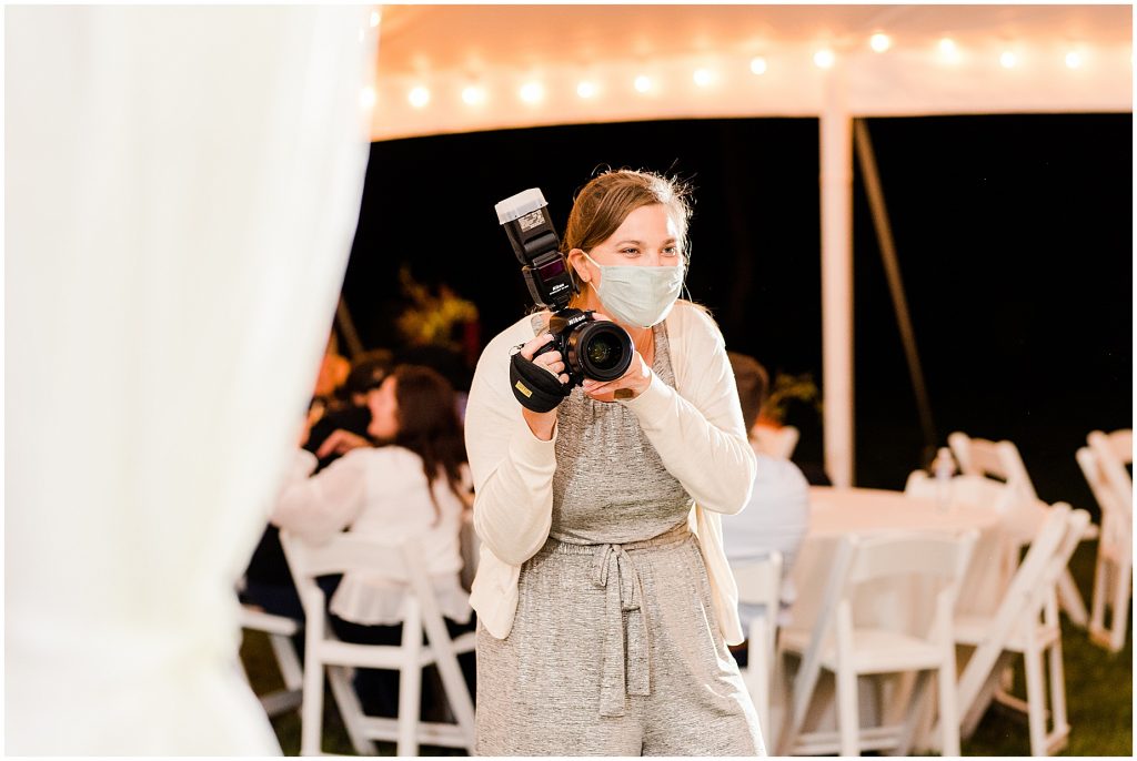 photographer at reception taking photos of people dancing in Richmond Va