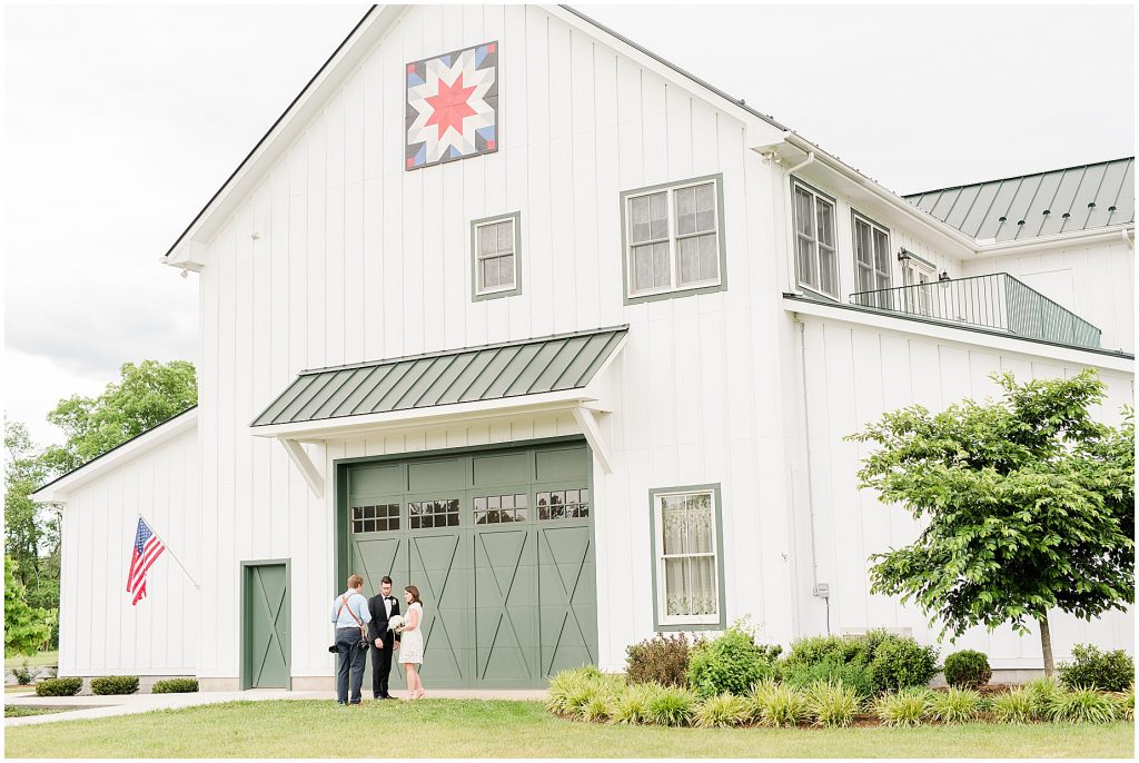 bride and groom with photographer at edgewood barn in Charlottesville